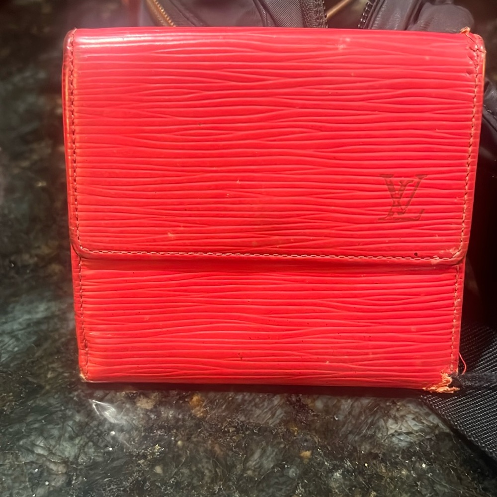 Red Louis Vuitton wallet
